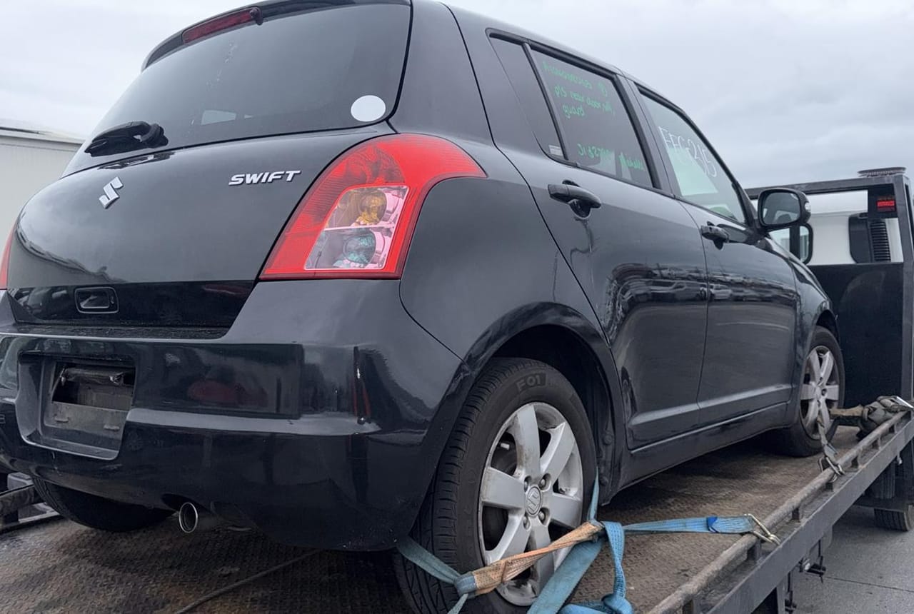 Old Suzuki Swift loaded for junk car removal in Palmerston North